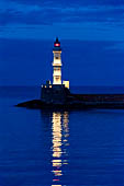 Hania - The inner harbour, the minaret-style lighthouse at night. 